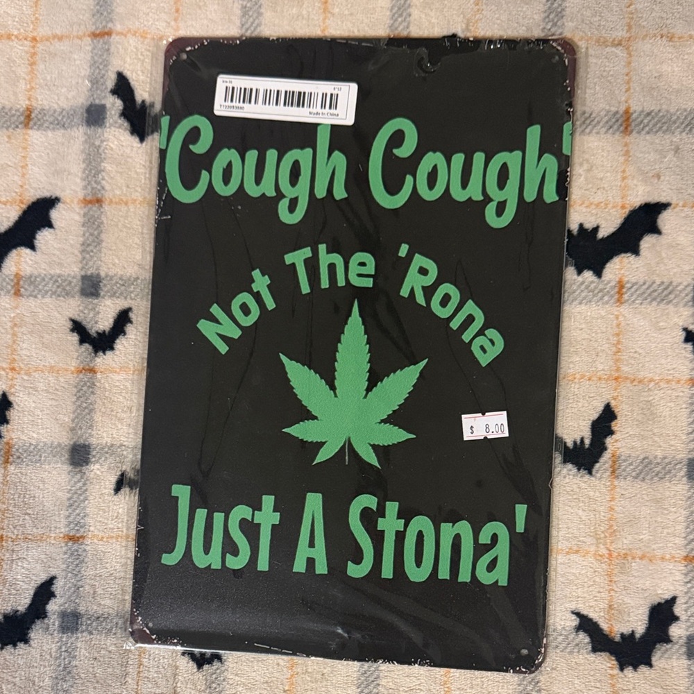 Black and Green Novelty Sign